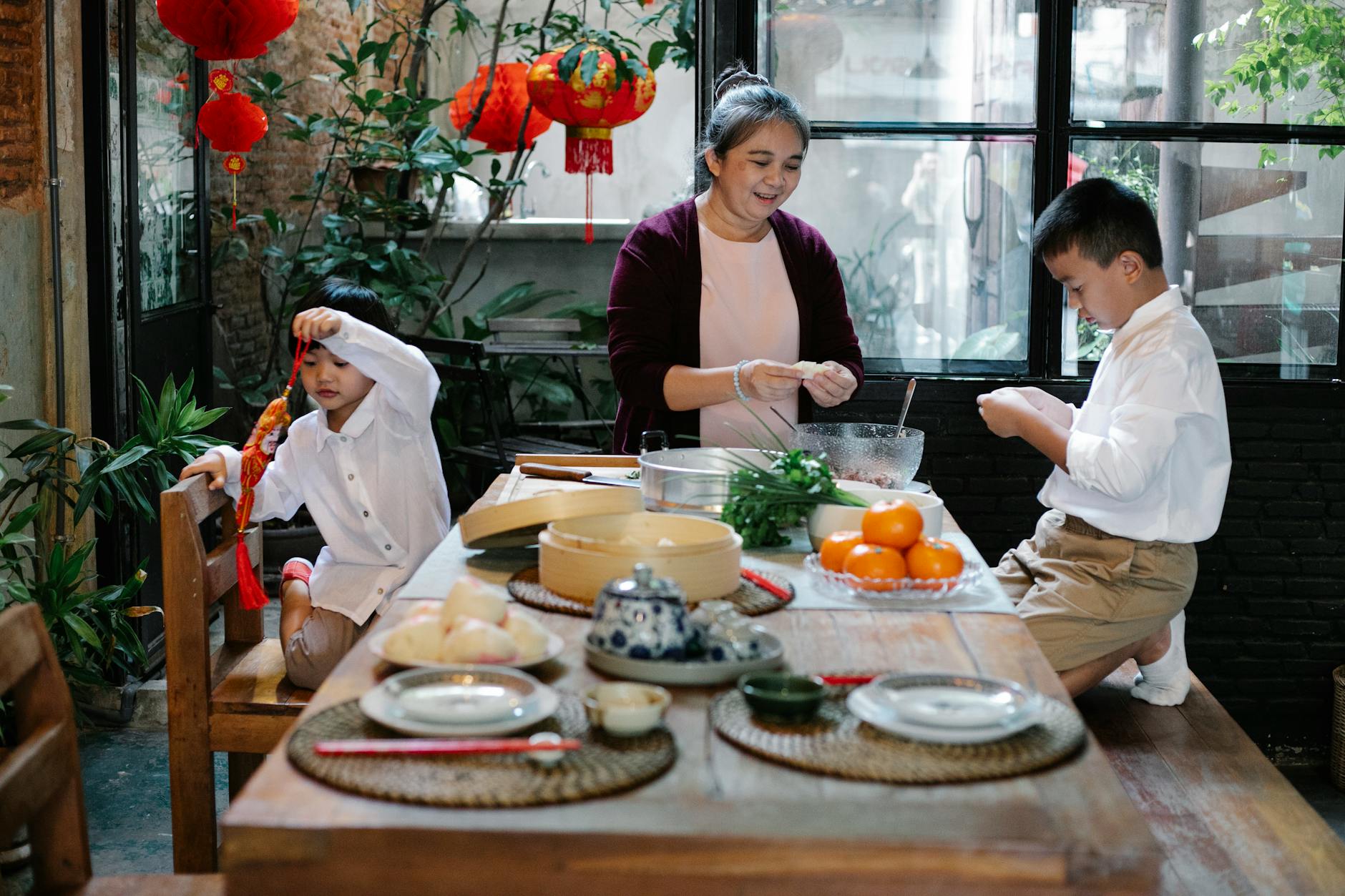 chinese family preparing food for a chinese new year