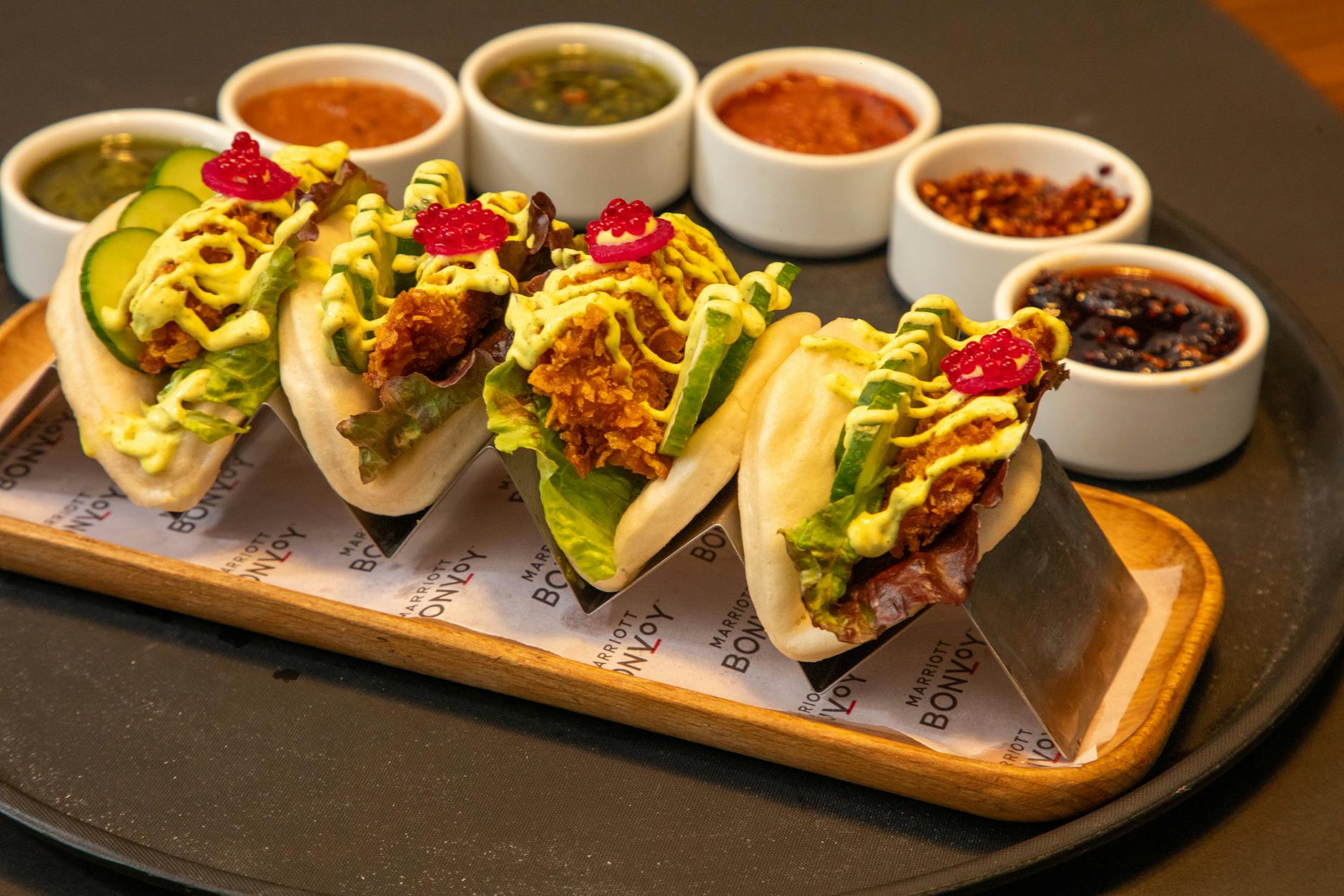 gourmet bao buns with assorted sauces